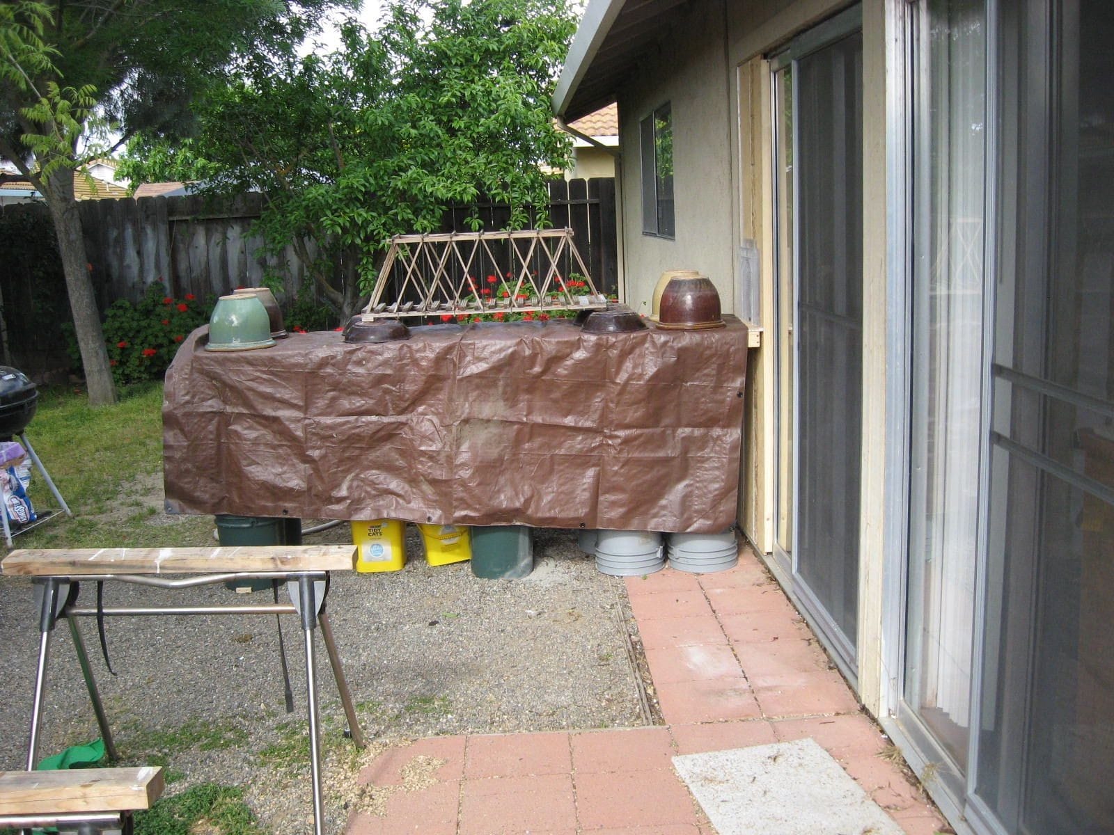 Rain arrived the first weekend of my build so I tarped the table.