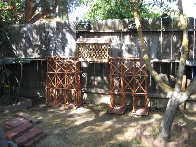 This image shows the coverd bridge at Creek.  It has large tressels at each end of the bridge.